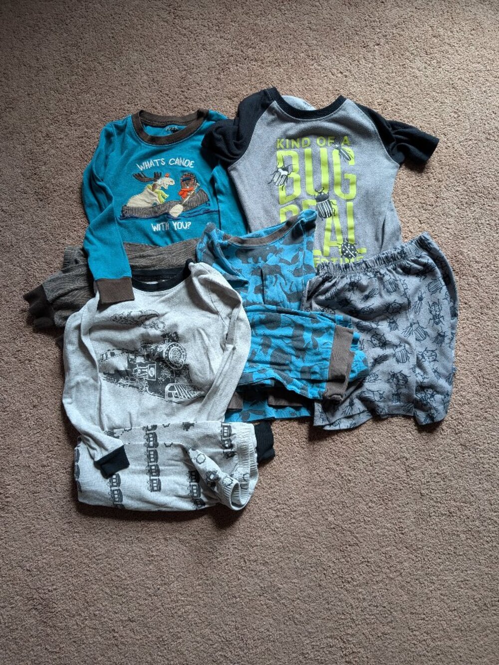 Lot of 4 sets of boy pajamas size 6. Pants shorts. Train, animal, bug, sports.